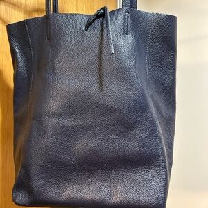 Navy blue, italian leather tote bag with leather tie fasteners